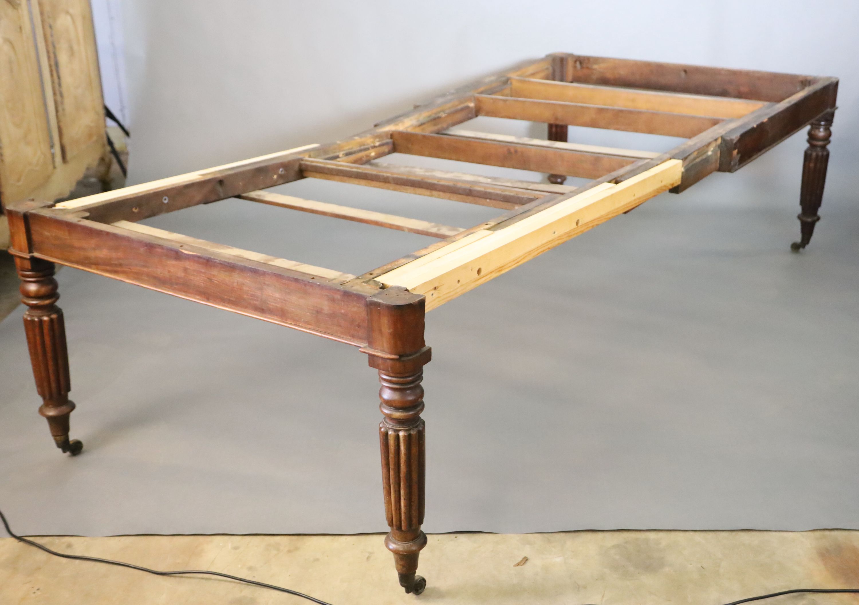 A Victorian mahogany extending dining table,